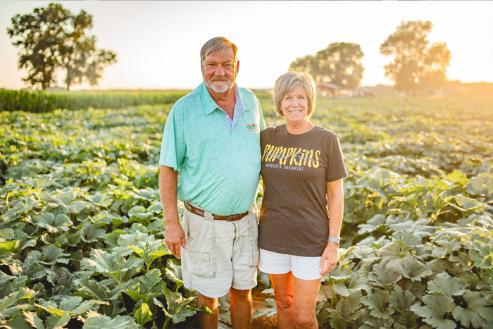Dallas and Katherine Peebles sitting by the fireplace